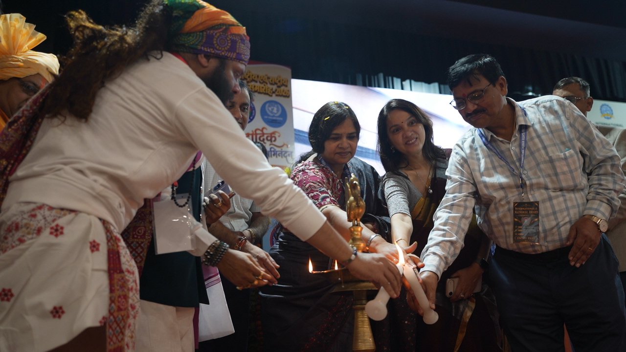 Ms. Sudha Rani Relangi, Information Commissioner, Central Information Commission, Government of India, New Delhi, and Mr. Dashrath Mishra, District Judge, lighting the ceremonial lamp.Date 30 Agest NDMC NEW DELHI